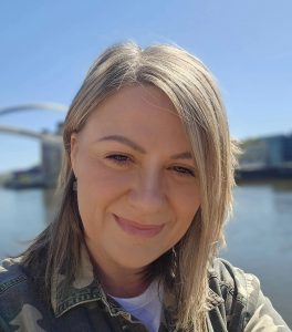A photo of Lyndsey n front of the river Tyne
